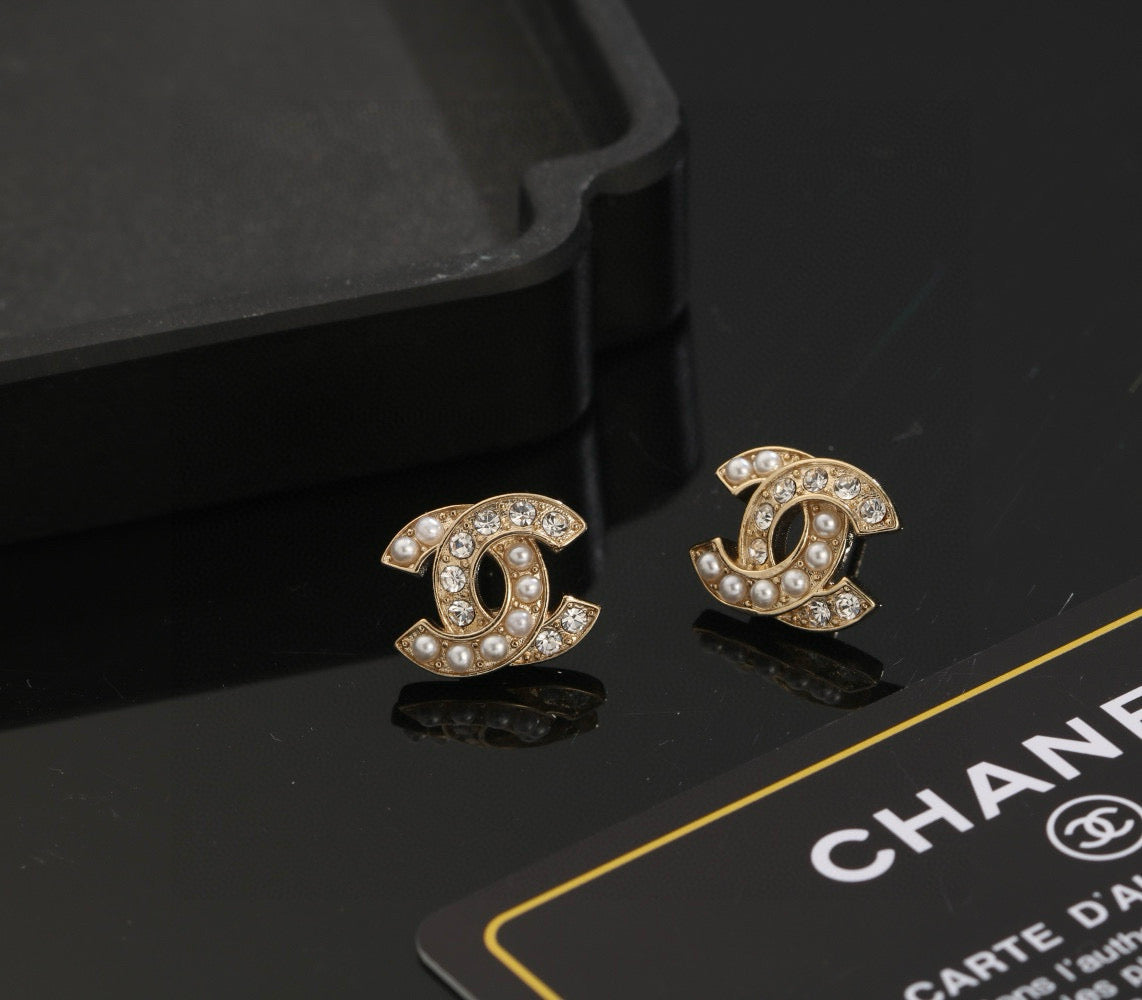 Chanel Interlocking C Stud Earrings - album image 2