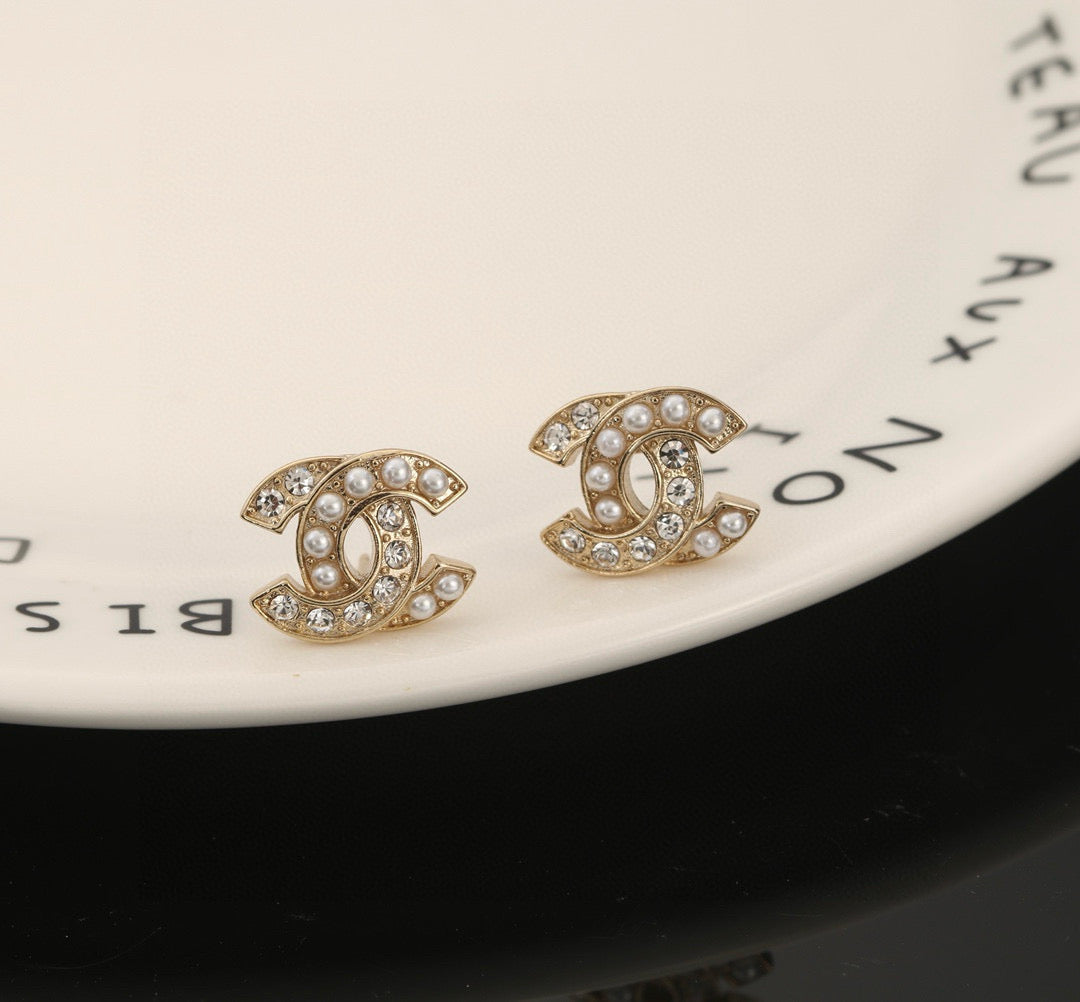 Chanel Interlocking C Stud Earrings - album image 4