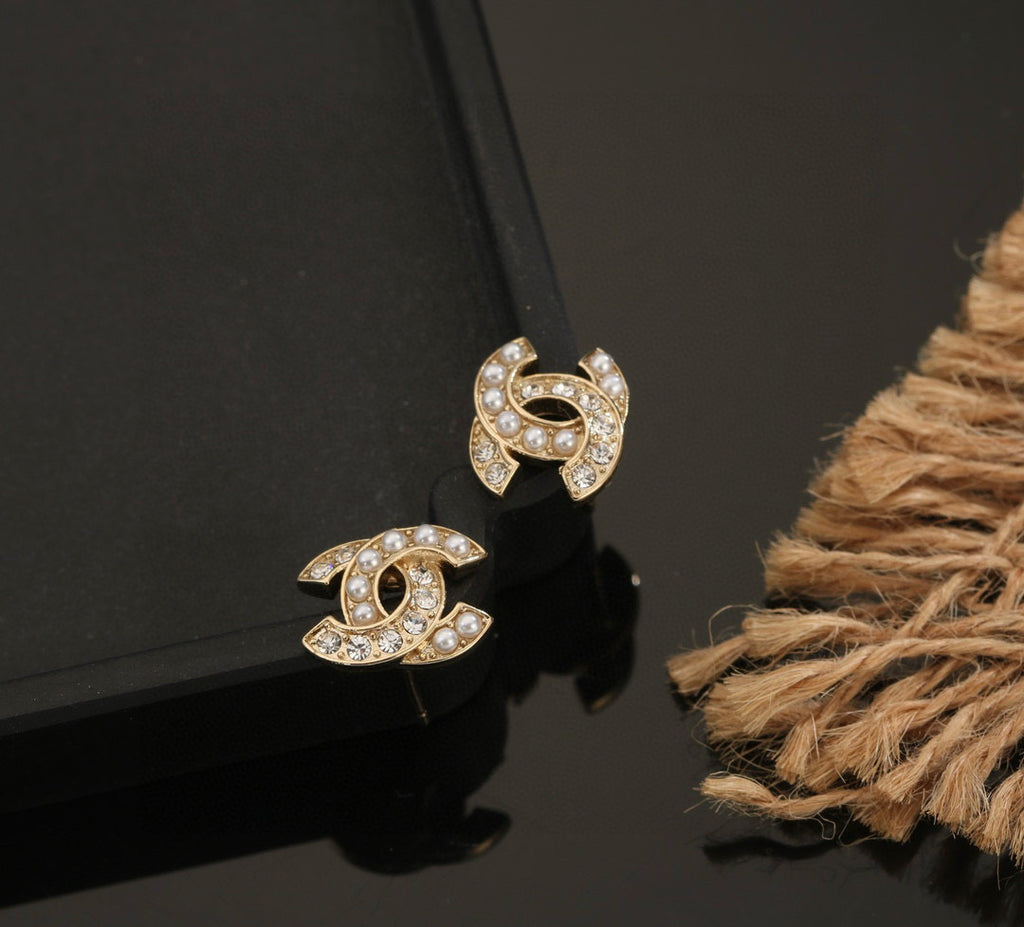Chanel Interlocking C Stud Earrings - album image 6