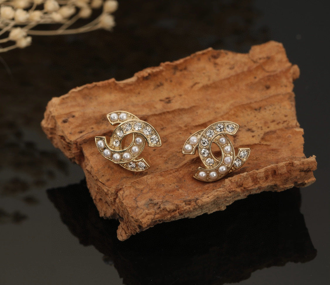 Chanel Interlocking C Stud Earrings - album image 5