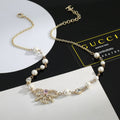 Chanel Bow Butterfly Pearl Circular Necklace - album image 1