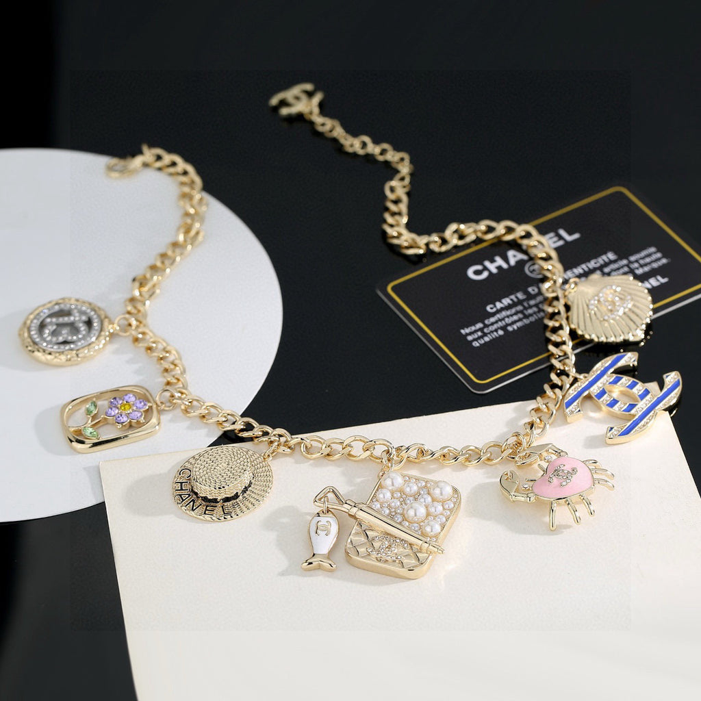 Chanel Interlocking C Shell Dragon Gold-Tone Pendant Necklace - album image 2