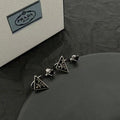 Prada Silver-Tone Open Triangle Drop Earrings - album image 1