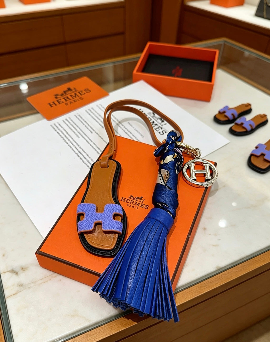 Hermès Tan Leather H Bag Charm with Blue Tassel - album image 6