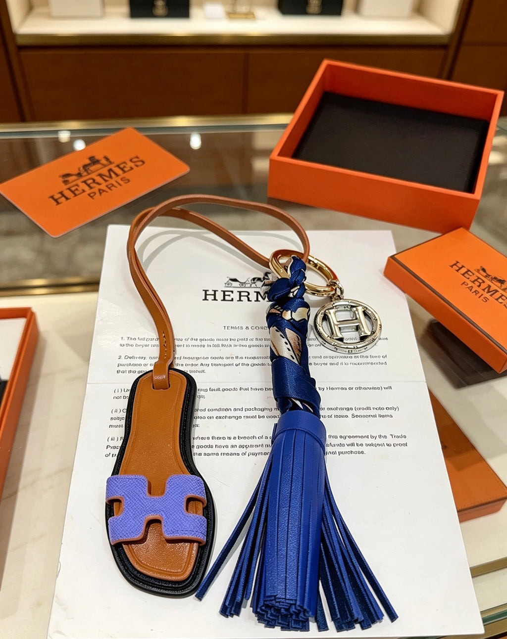 Hermès Tan Leather H Bag Charm with Blue Tassel - album image 5