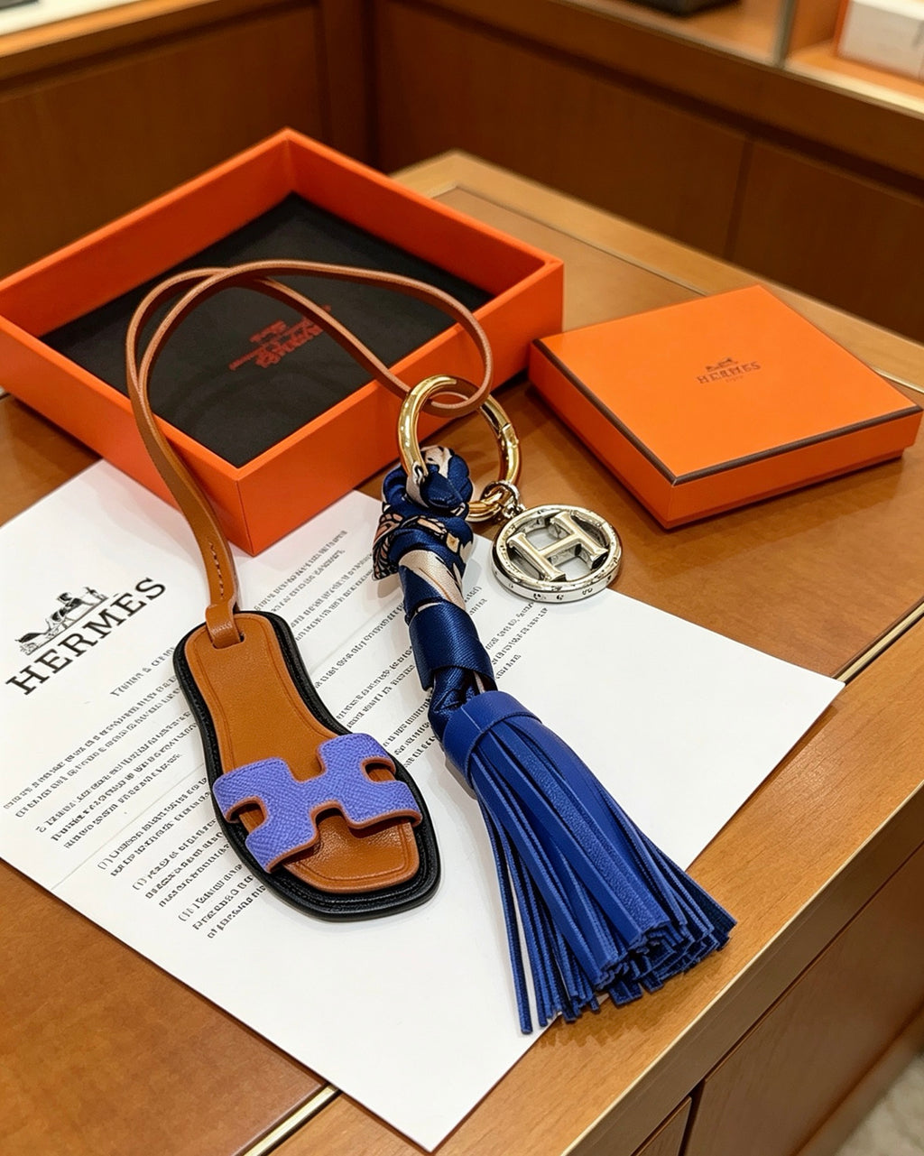 Hermès Tan Leather H Bag Charm with Blue Tassel - album image 3