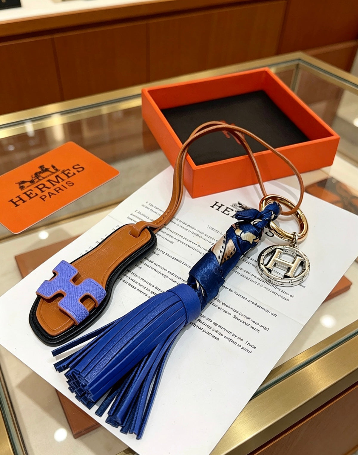 Hermès Tan Leather H Bag Charm with Blue Tassel - album image 2