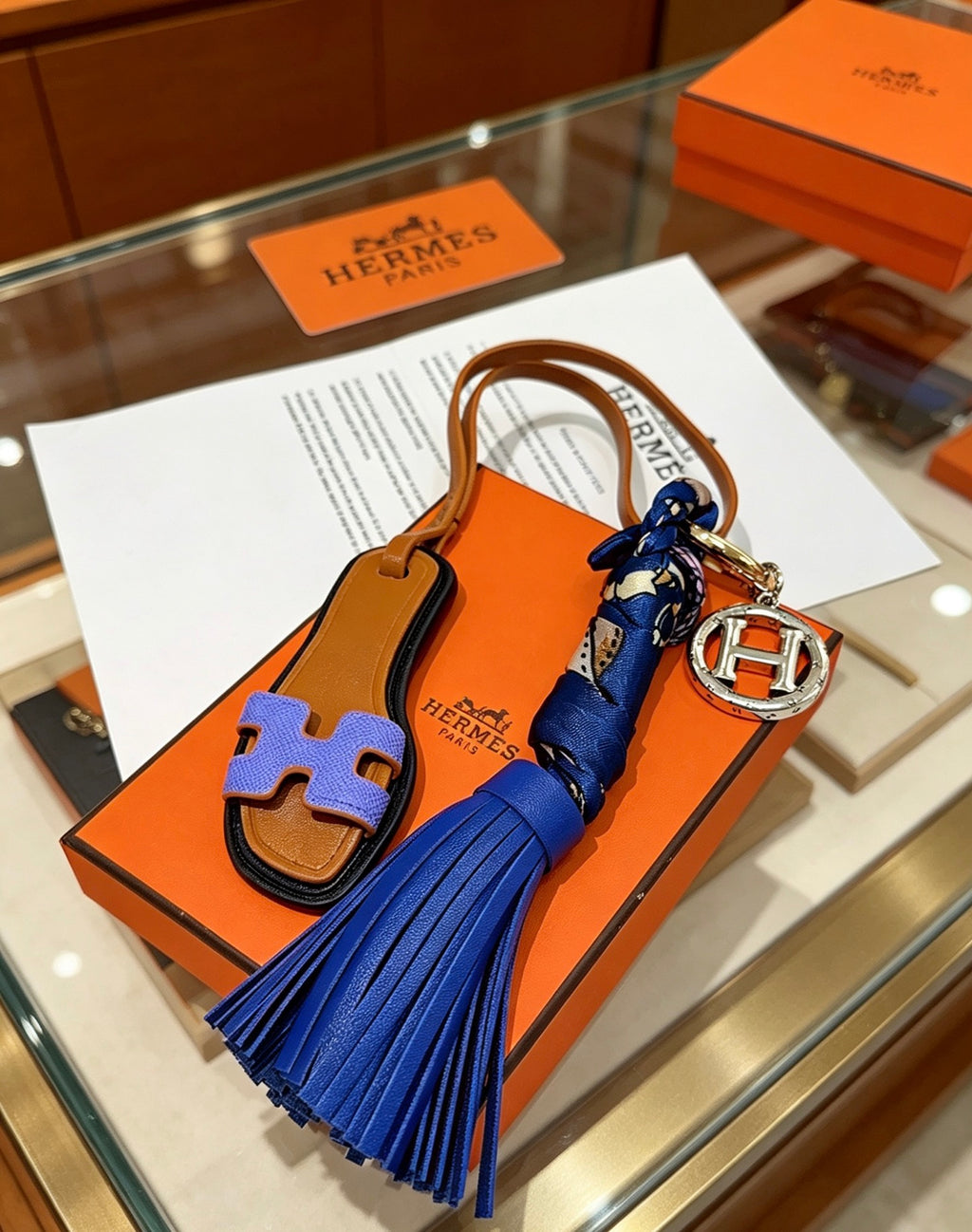Hermès Tan Leather H Bag Charm with Blue Tassel - album image 4