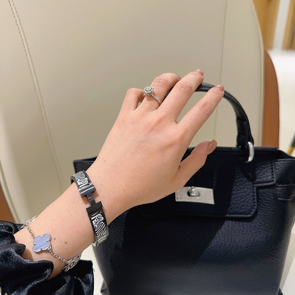 Hermès Gold-Tone Black Printed H-Clasp Bangle - album image 3