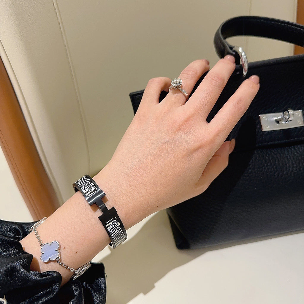 Hermès Gold-Tone Black Printed H-Clasp Bangle - album image 9