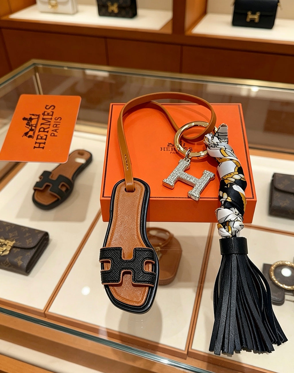 Hermès Tan Leather H Bag Charm with Black Tassel - album image 6
