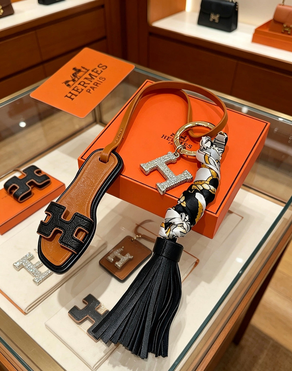 Hermès Tan Leather H Bag Charm with Black Tassel - album image 2