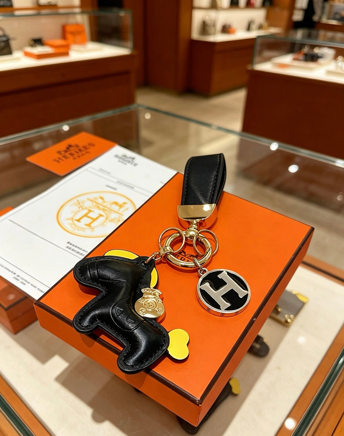 Hermès Black Horse and Gold-Tone H Charm Keychain - album image 4