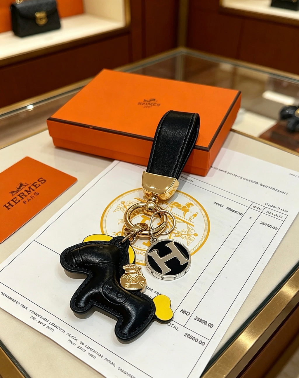 Hermès Black Horse and Gold-Tone H Charm Keychain - album image 3