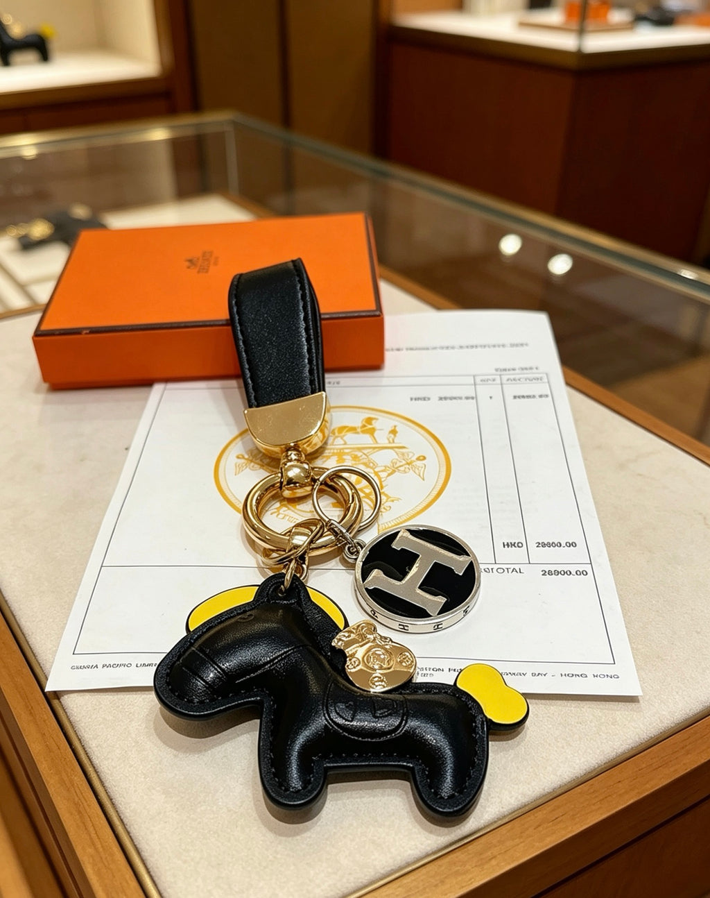 Hermès Black Horse and Gold-Tone H Charm Keychain - album image 6