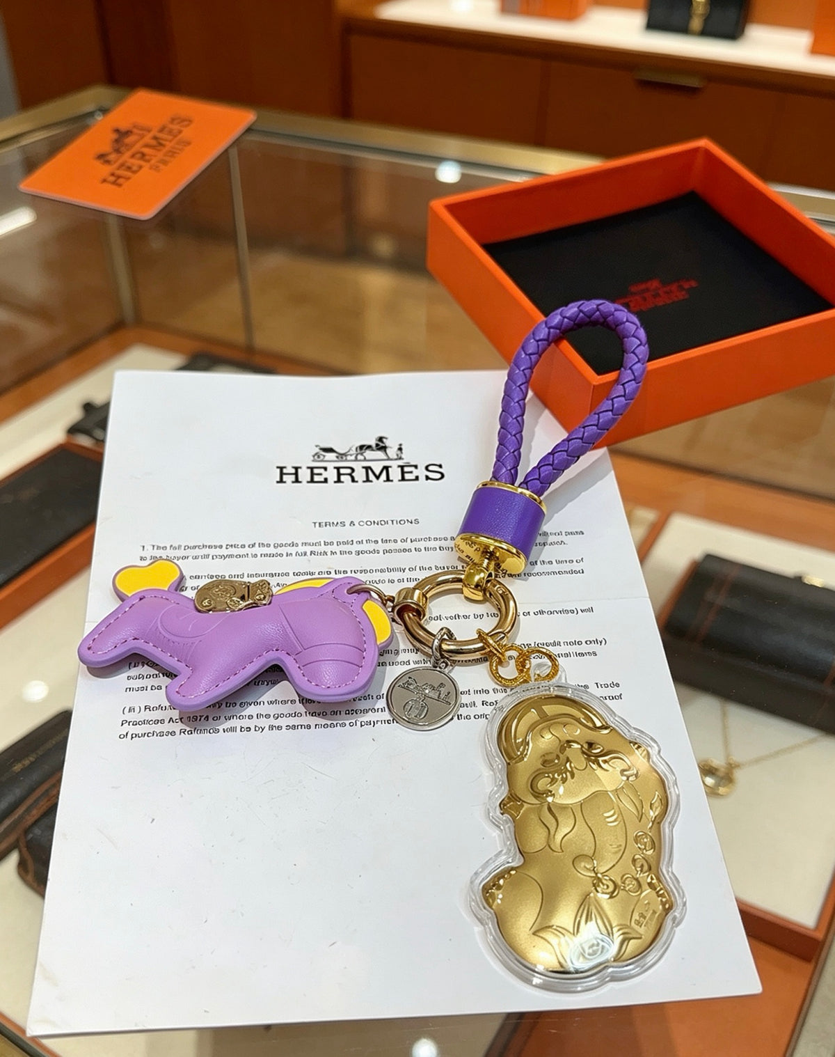 Hermès Lavender Horse Keychain with Gold-Tone Charm and Purple Cord - album image 2