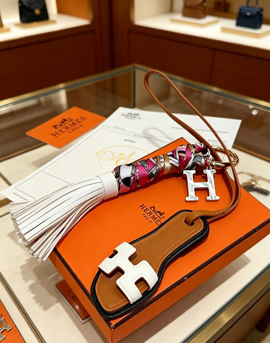 Hermès Tan Leather H Bag Charm with White Tassel - album image 2