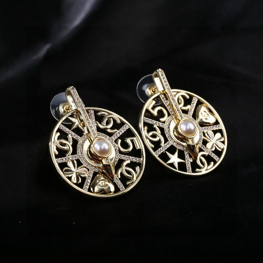 Chanel Gold-Tone Openwork Medallion Hoop Earrings - album image 6