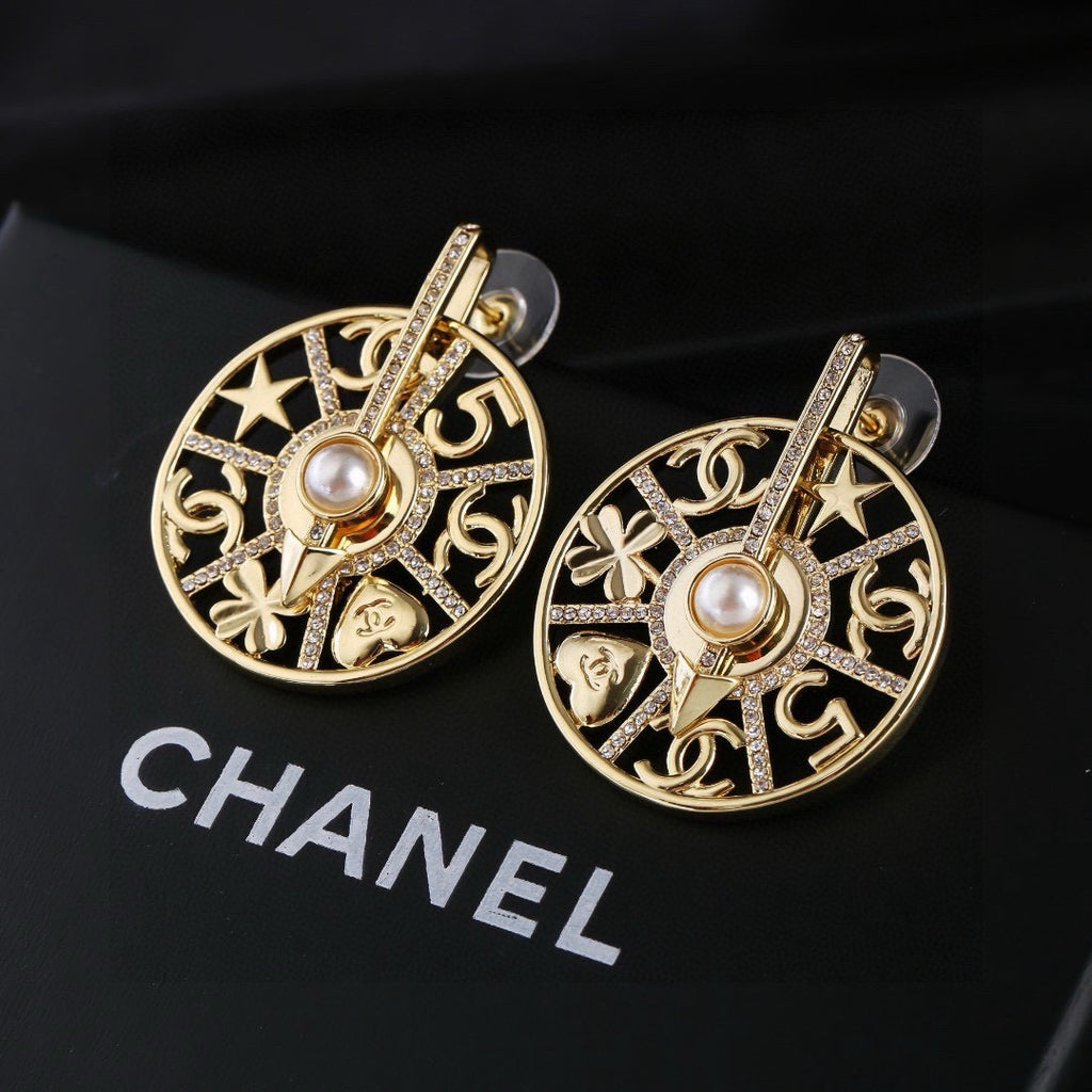 Chanel Gold-Tone Openwork Medallion Hoop Earrings - album image 1