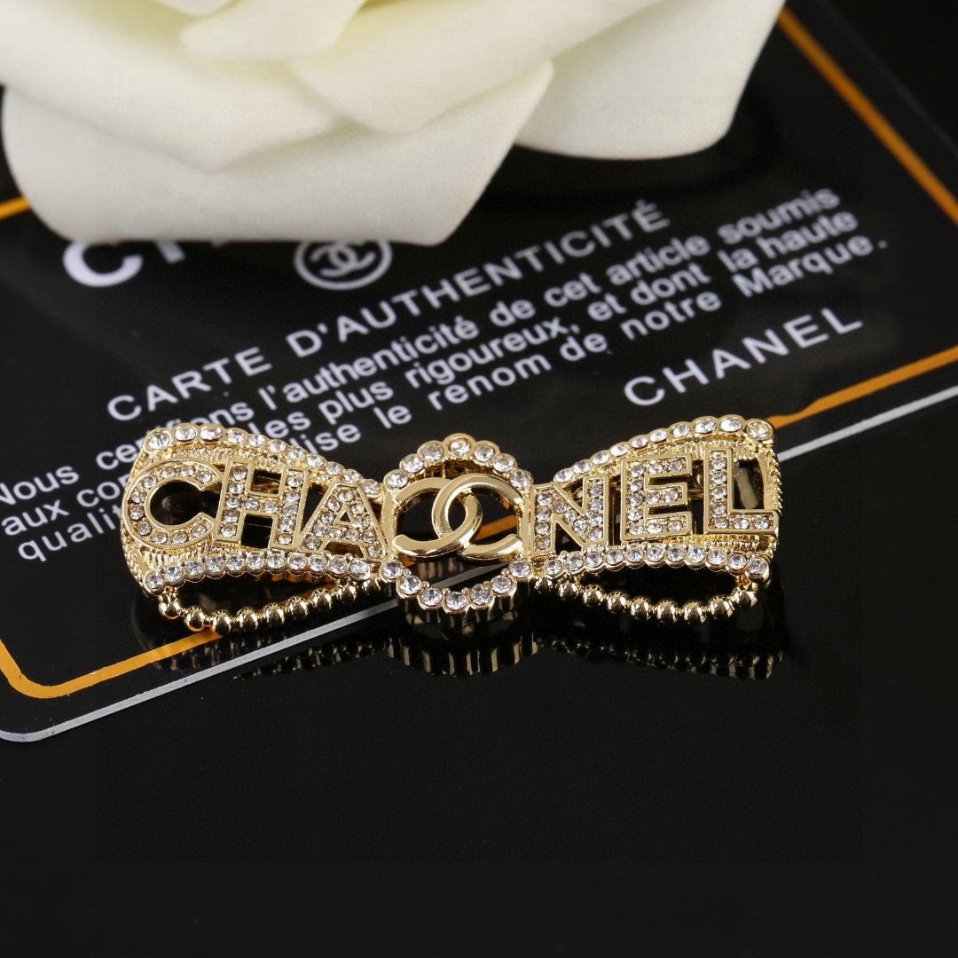 Chanel Interlocking C Bow Butterfly Crystal Accent Brooch - album image 2
