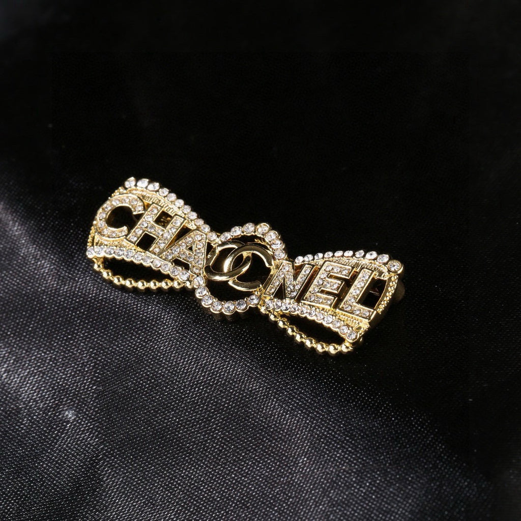 Chanel Interlocking C Bow Butterfly Crystal Accent Brooch - album image 6