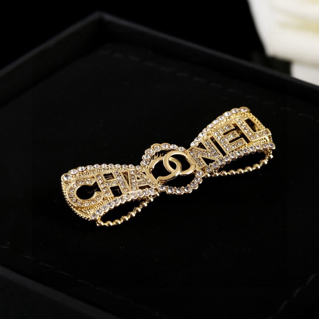 Chanel Interlocking C Bow Butterfly Crystal Accent Brooch - album image 3