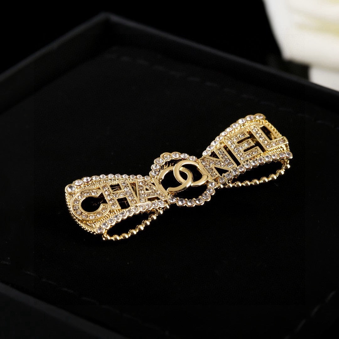Chanel Interlocking C Bow Butterfly Crystal Accent Brooch - album image 3