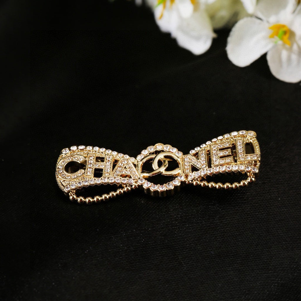 Chanel Interlocking C Bow Butterfly Crystal Accent Brooch - album image 7