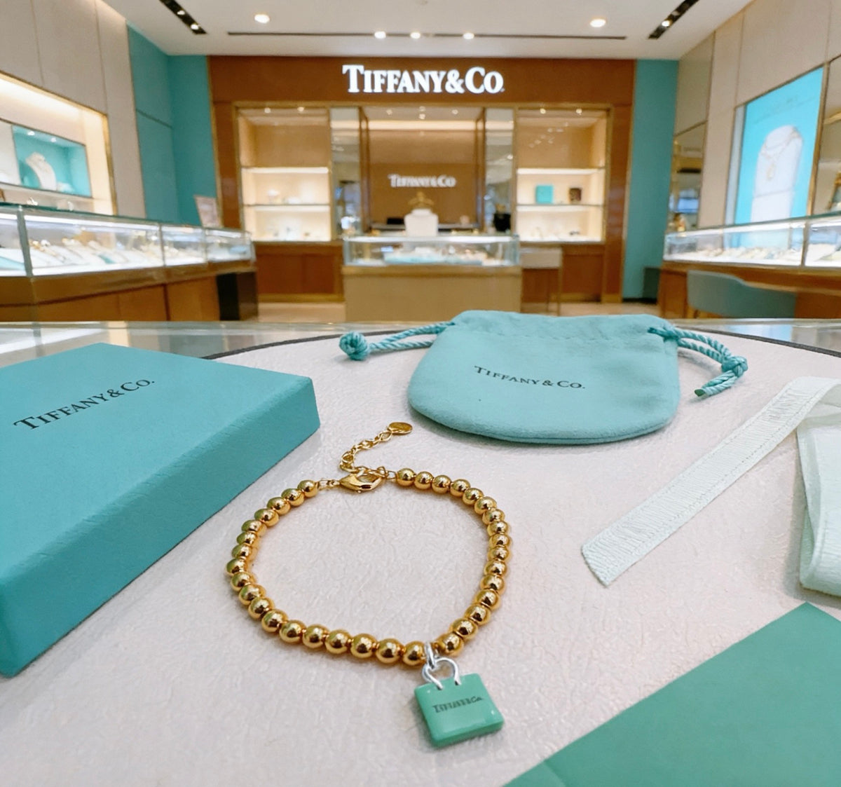 Tiffany & Co. Gold-Tone Blue Square Bracelet - album image 1