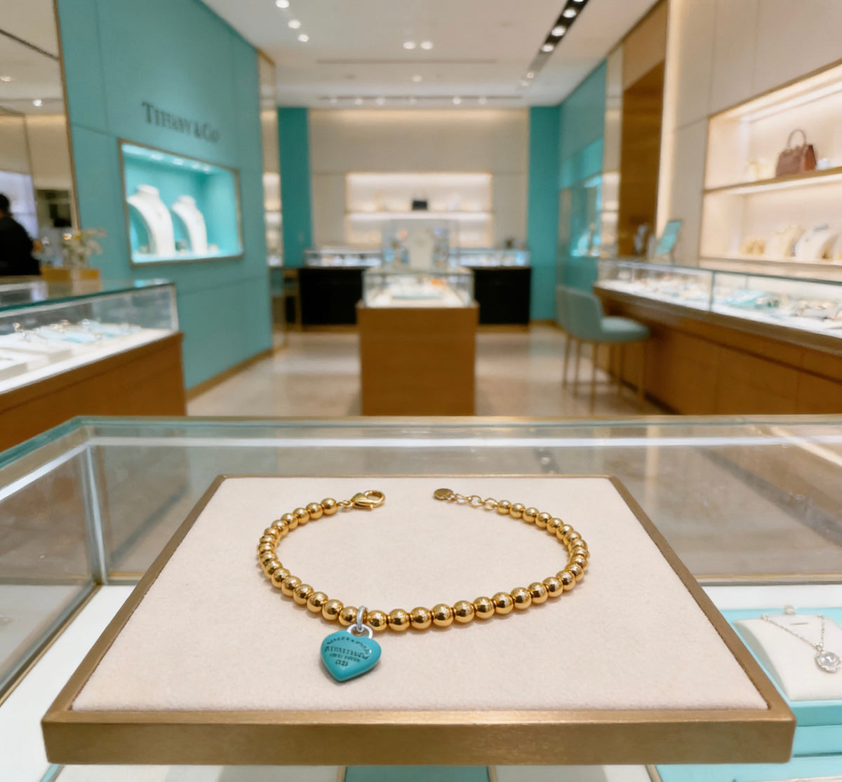 Tiffany & Co. Gold-Tone Blue Heart Bead Bracelet - album image 5