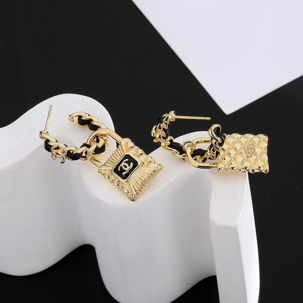 Chanel Interlocking C Resin Gold-Tone Stud Earrings - album image 6