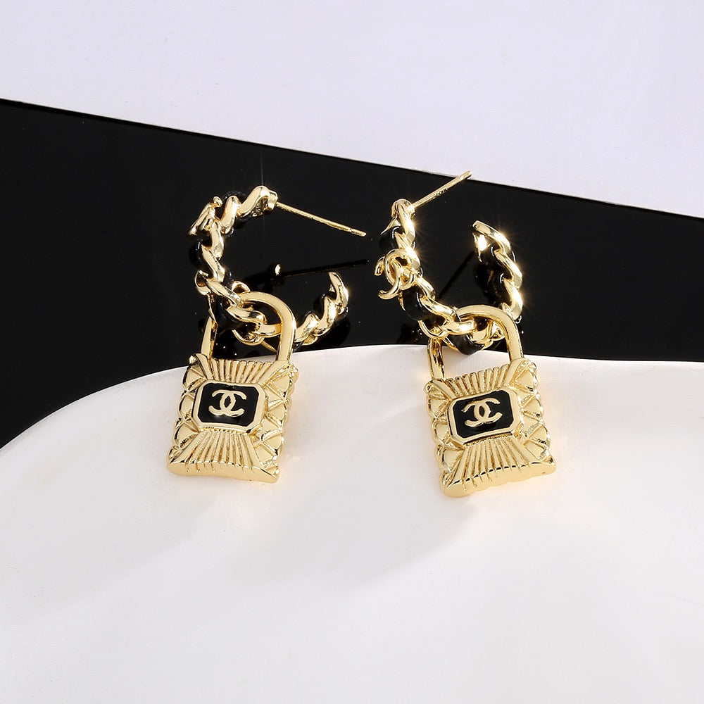 Chanel Interlocking C Resin Gold-Tone Stud Earrings - album image 3
