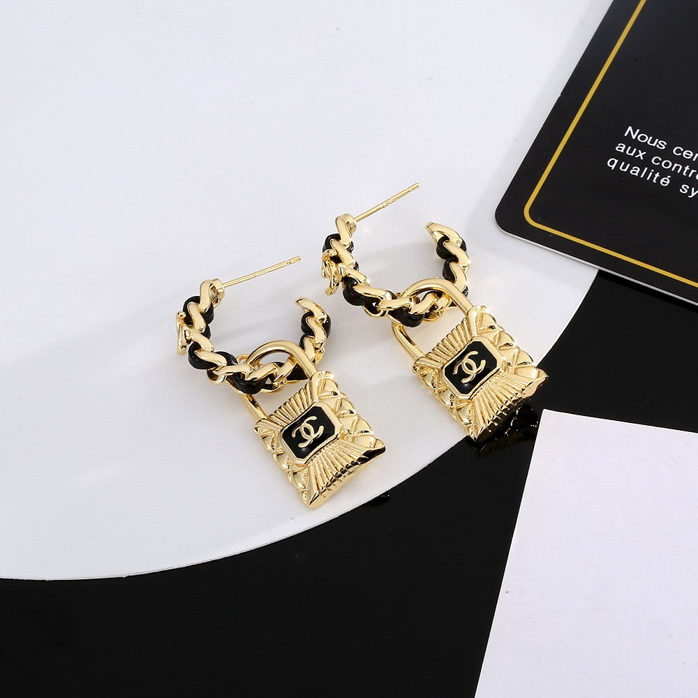 Chanel Interlocking C Resin Gold-Tone Stud Earrings - album image 2