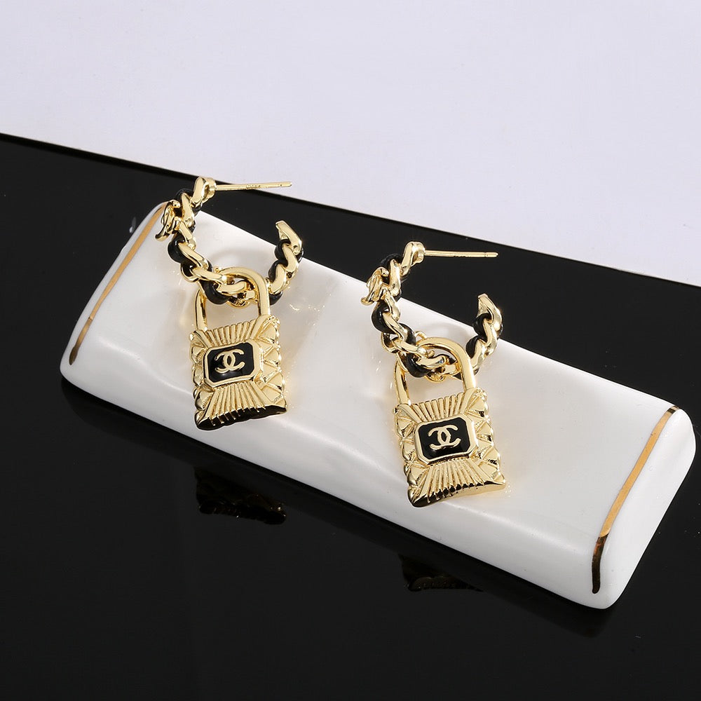 Chanel Interlocking C Resin Gold-Tone Stud Earrings - album image 4