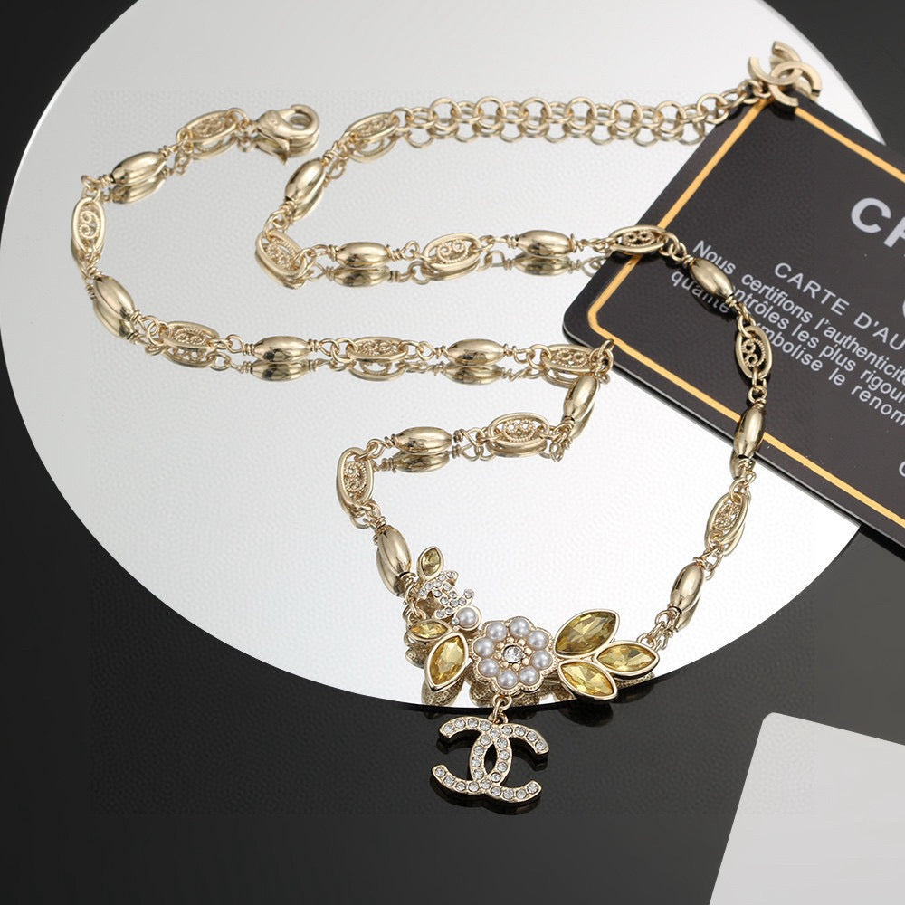 Chanel Camellia Gold-Tone Letter Necklace - album image 4