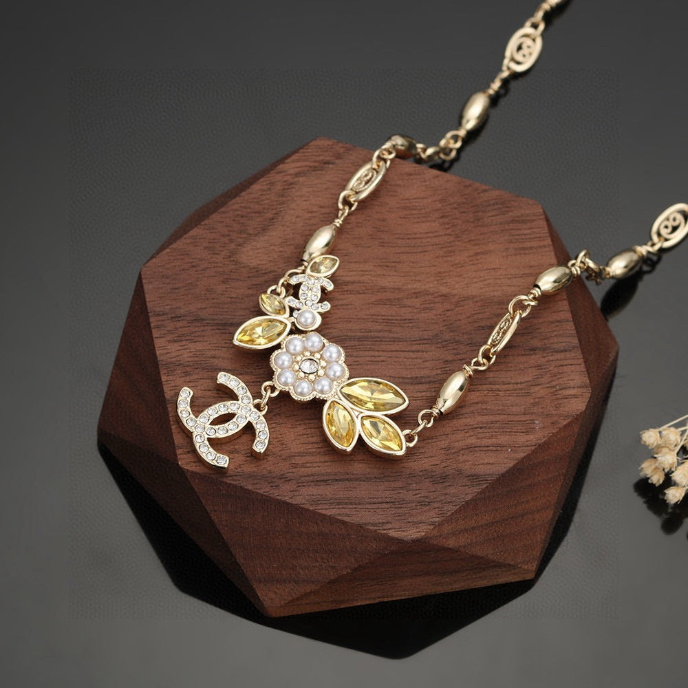 Chanel Camellia Gold-Tone Letter Necklace - album image 3