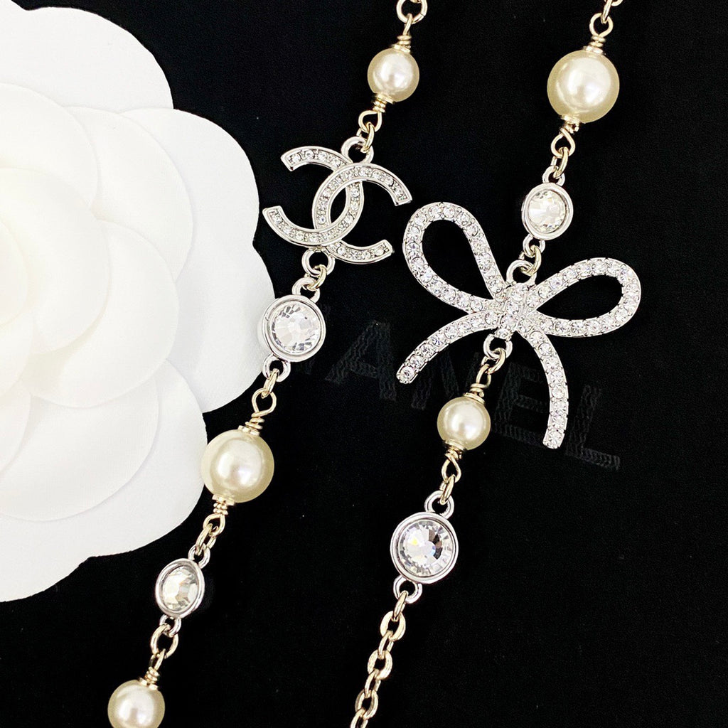 Chanel Silver-Tone Camellia and Chain Drop Earrings - album image 2