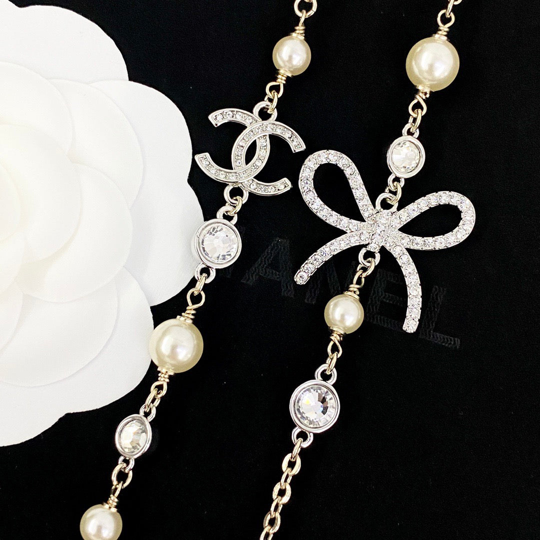 Chanel Silver-Tone Camellia and Chain Drop Earrings - album image 2