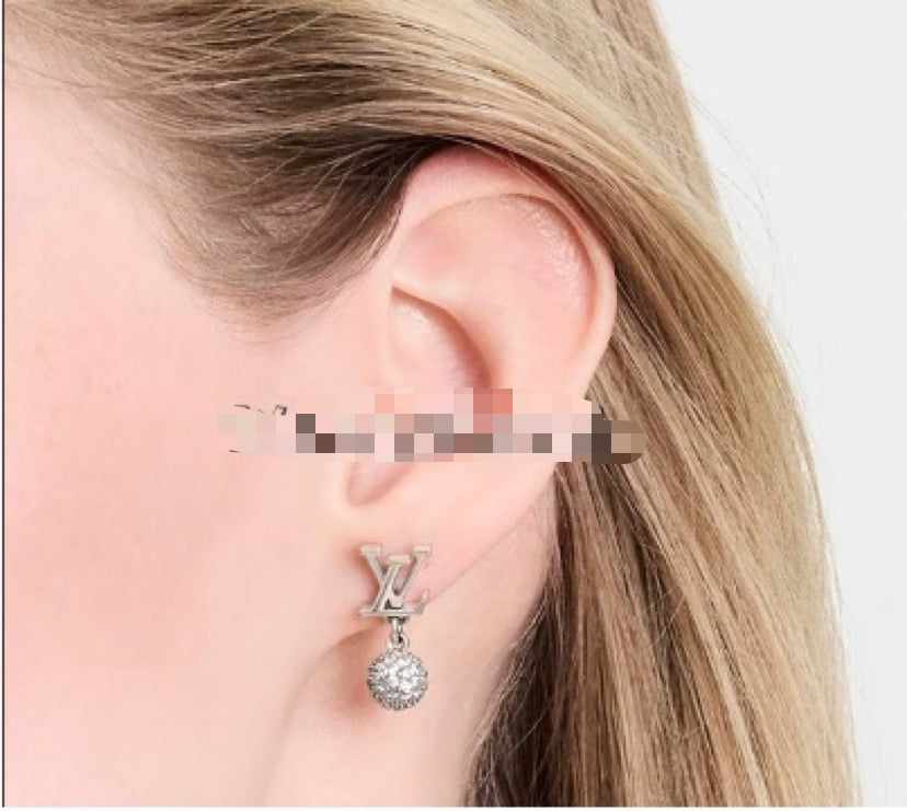 Louis Vuitton LV Letter Stud Earrings - album image 4