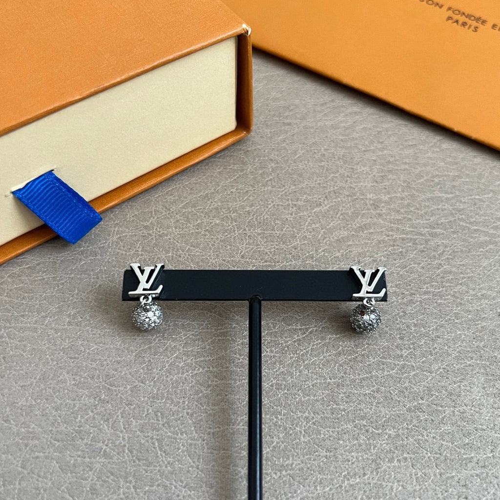 Louis Vuitton LV Letter Stud Earrings - album image 6