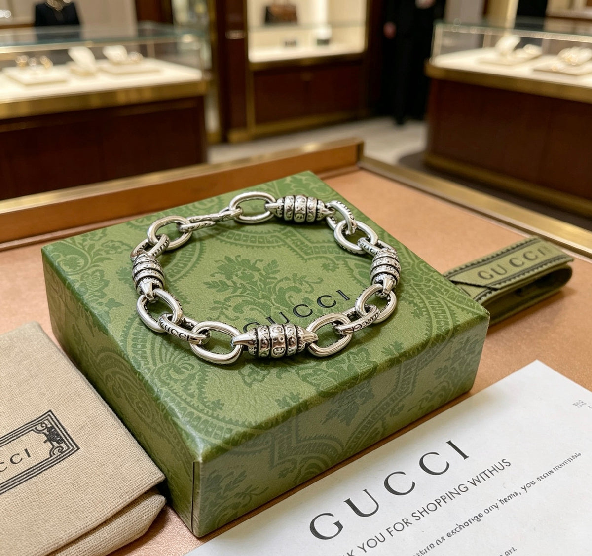Gucci Silver-Tone Oval Link Bracelet with G Charm - album image 2