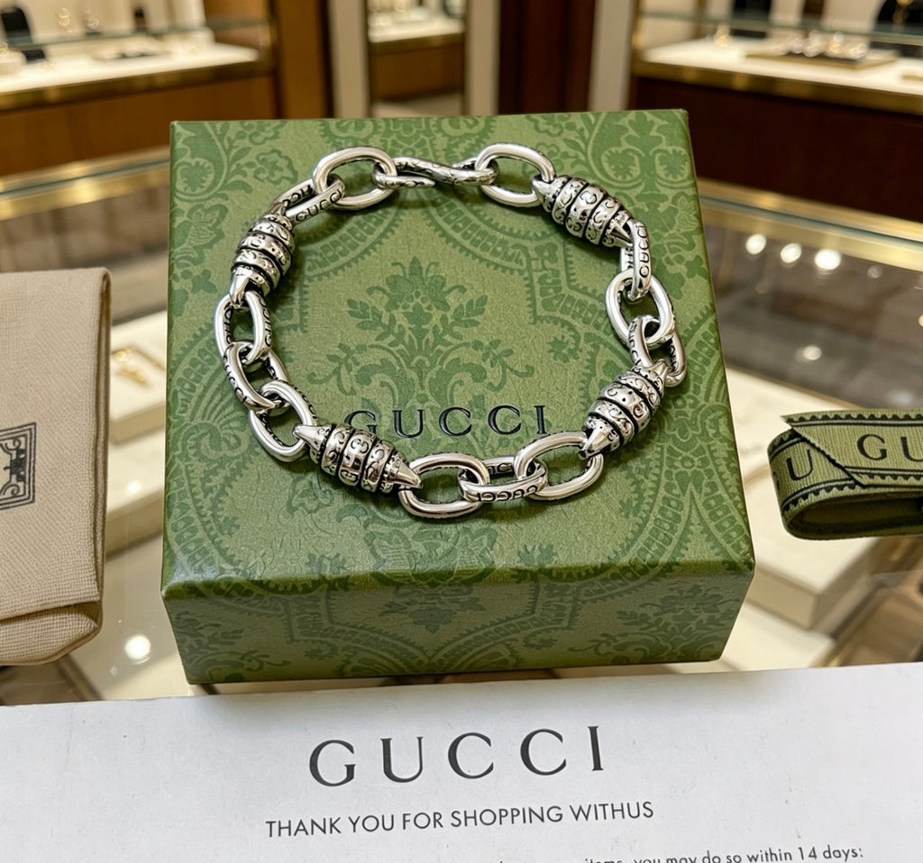 Gucci Silver-Tone Oval Link Bracelet with G Charm - album image 1