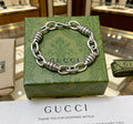 Gucci Silver-Tone Oval Link Bracelet with G Charm - album image 1