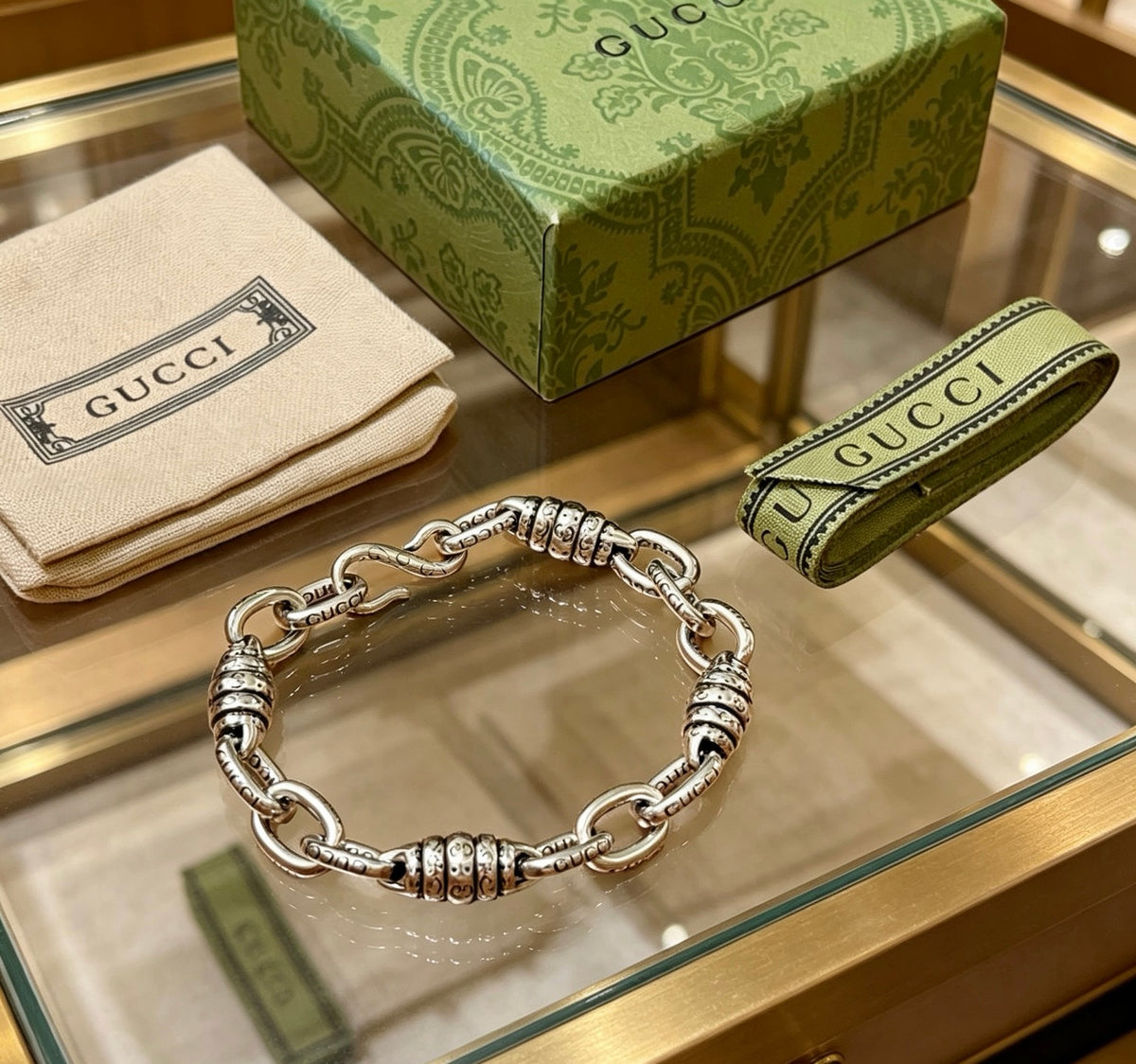 Gucci Silver-Tone Oval Link Bracelet with G Charm - album image 6