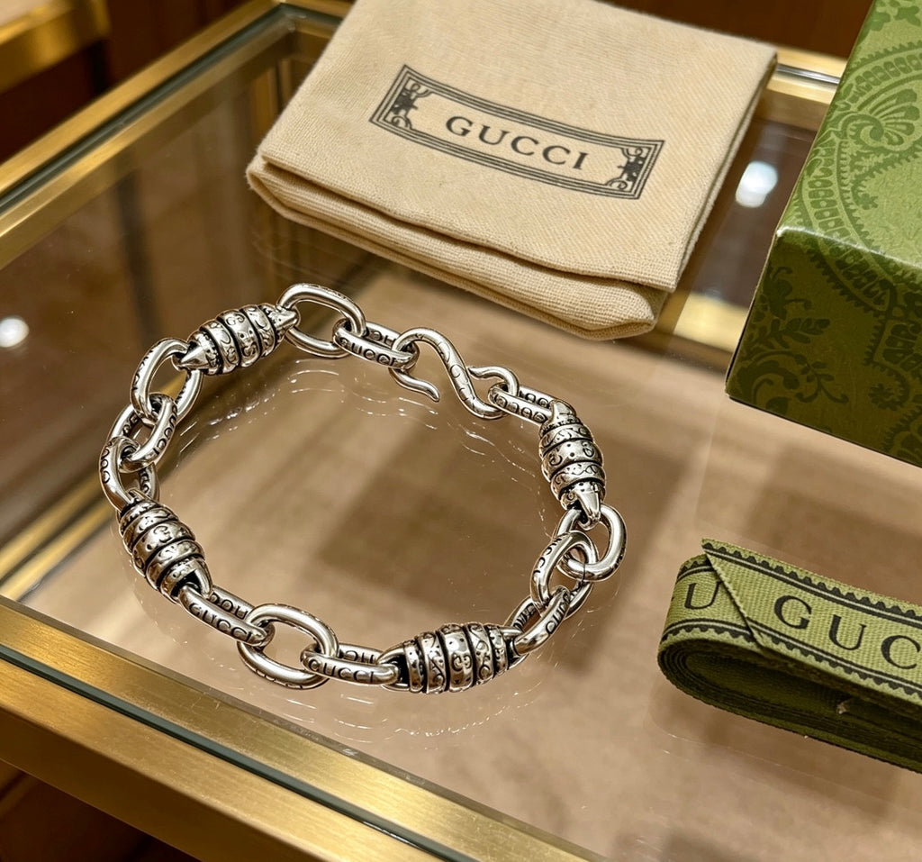 Gucci Silver-Tone Oval Link Bracelet with G Charm - album image 8