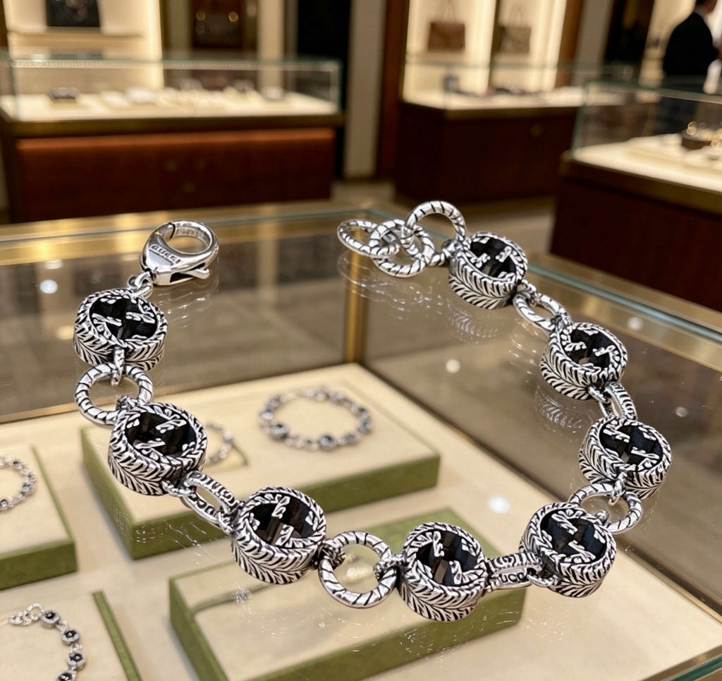 Gucci Silver-Tone Dark Crystal and G Link Bracelet - album image 1