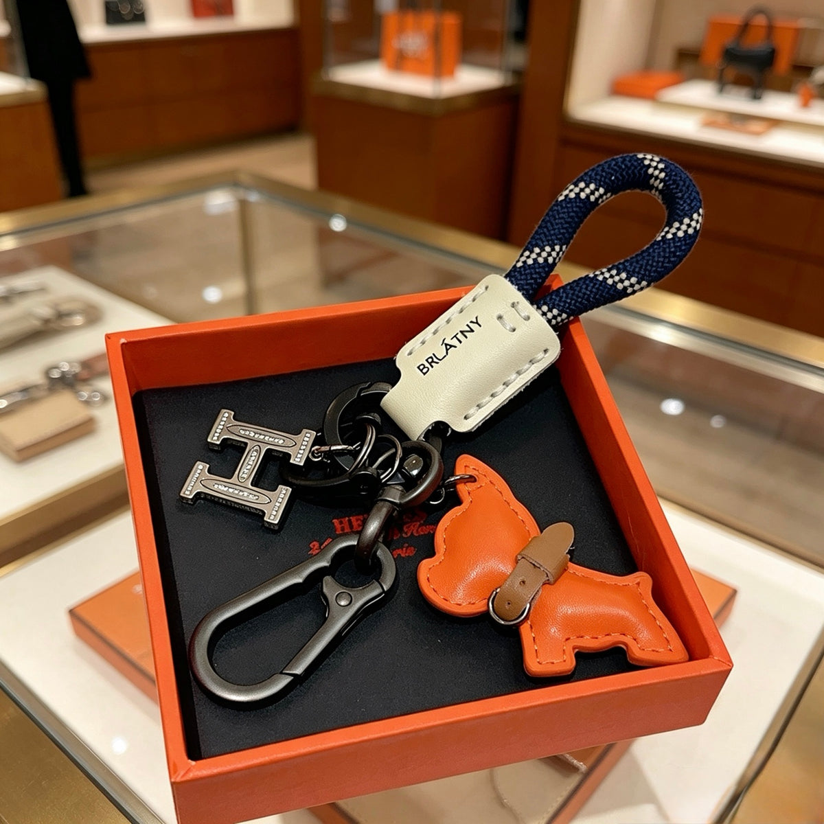 Hermès Orange Horse and H-Charm Keychain with Navy Strap - album image 3