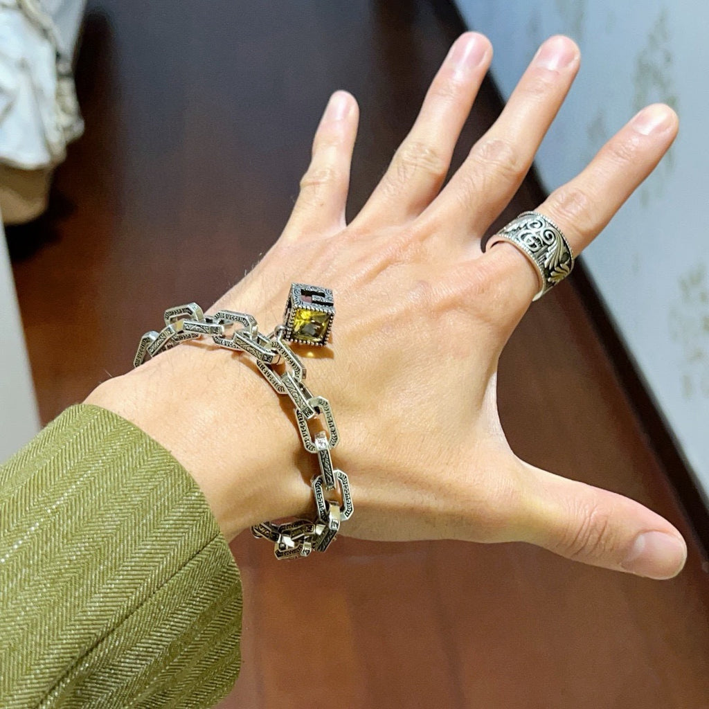 Gucci Silver-Tone Rectangular Link Bracelet with Cube Charm - album image 3