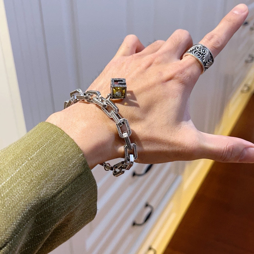 Gucci Silver-Tone Rectangular Link Bracelet with Cube Charm - album image 9
