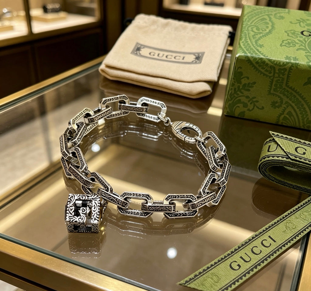 Gucci Silver-Tone Rectangular Link Bracelet with Cube Charm - album image 4
